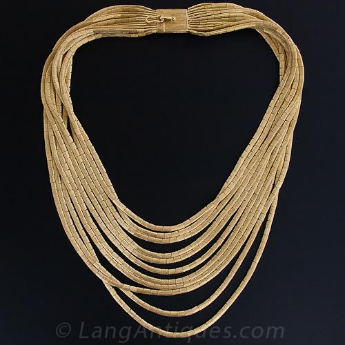 multi string gold necklace