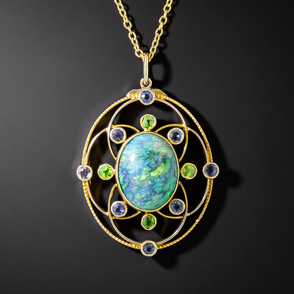 An exquisite combination of tsavorite garnet and white opal, united within  a sparkling halo of diamonds in this one-of-a-kind necklace. �... |  Instagram
