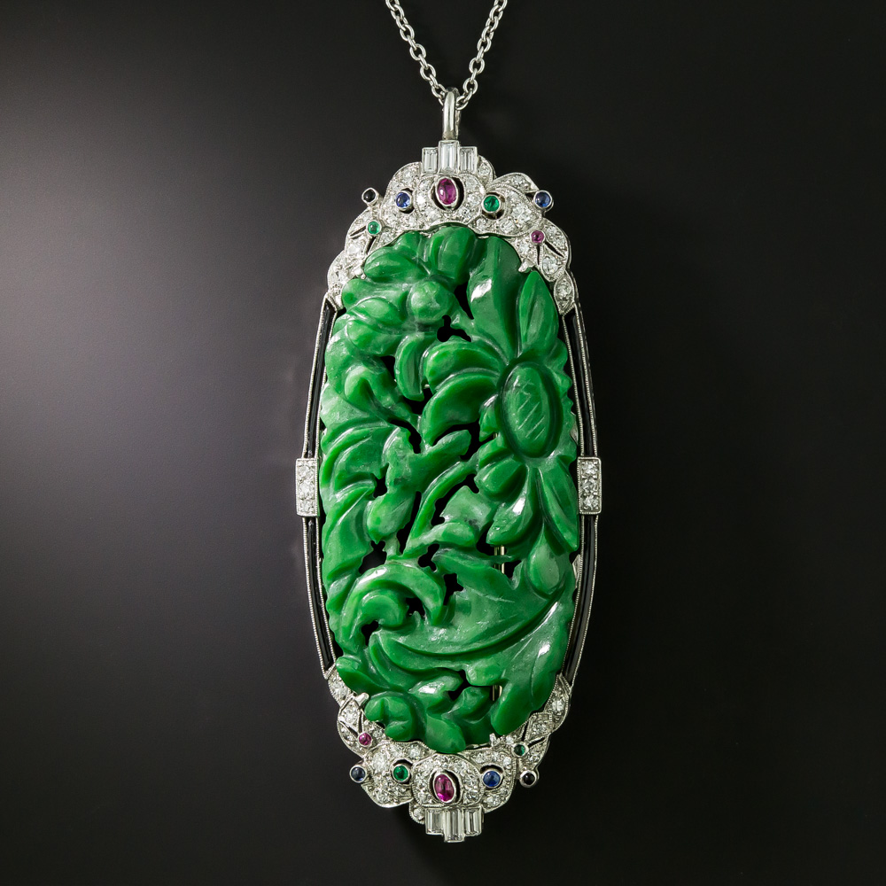 Carved jade hot sale pendant