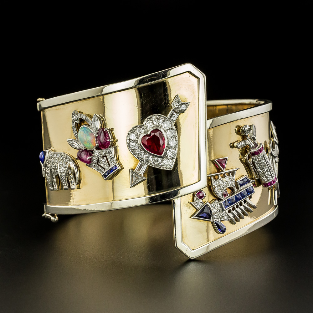 Gem set and diamond charm bracelet, three charms Cartier, 1920s