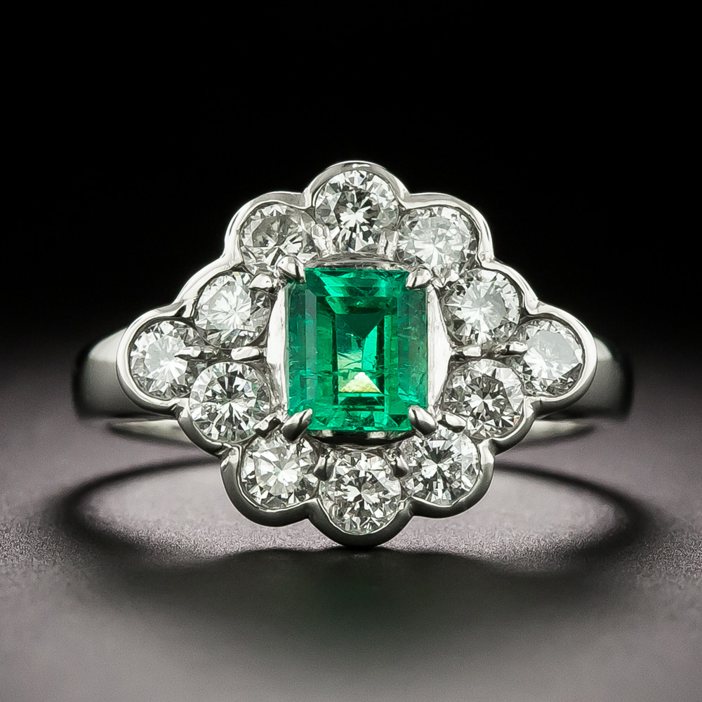 Contemporary .65 Carat Emerald and Diamond Ring