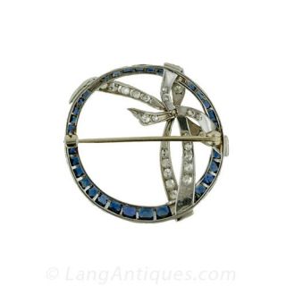 1920s Platinum Sapphire and Diamond Bow and Circle Pin