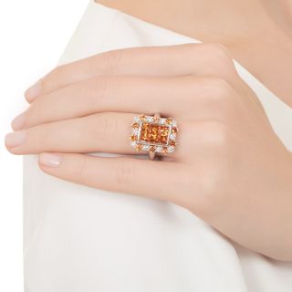 Cushion-Shaped Invisibly-Set Orange Sapphire and Diamond Ring