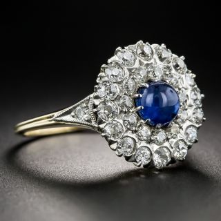 Edwardian Cabochon Sapphire and Double Diamond Halo Ring