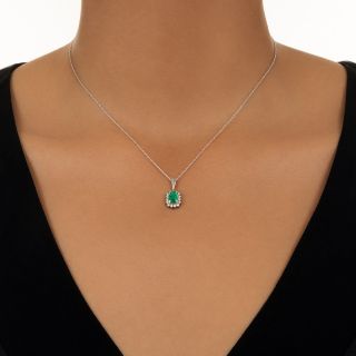  .76 Carat Emerald and Diamond Halo Pendant