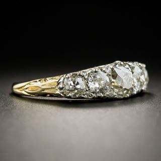 Late Victorian Five-Stone Diamond Carved Ring with Rose-Cut Diamond Accents