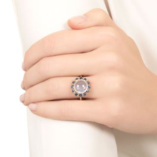 Mid-Century Moonstone and Sapphire Halo Ring, by Untermeyer