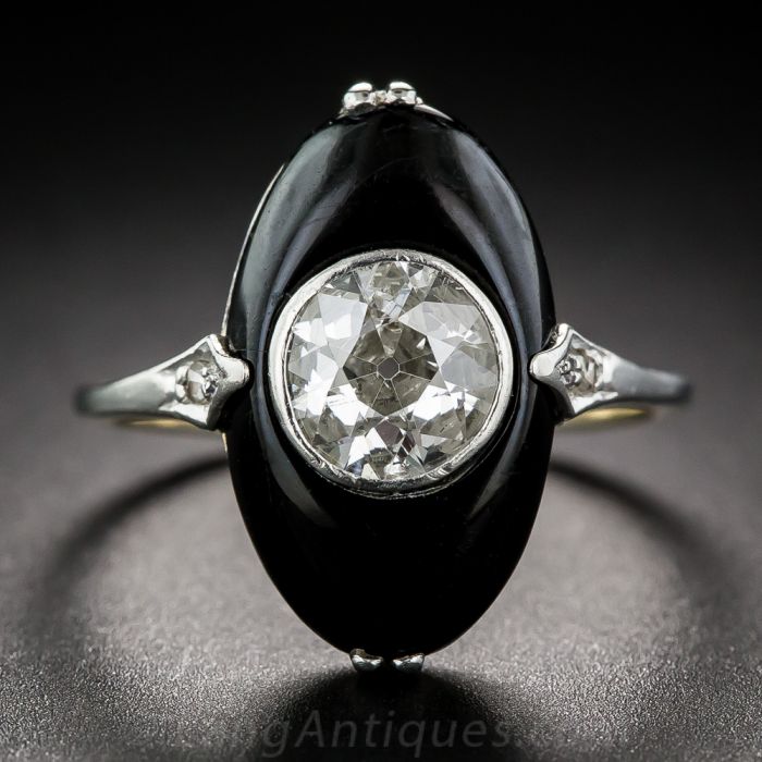 black onyx ring with diamond in center