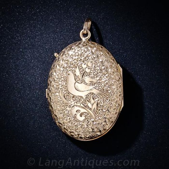 antique bird locket