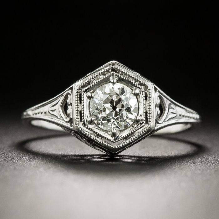 Free Photos - An Impressive Diamond Engagement Ring, Showcasing A Large And  Flawless Crystal-clear Centerpiece. The Ring Is Crafted With Sterling  Silver And Boasts A Unique Design, Making It An Elegant And
