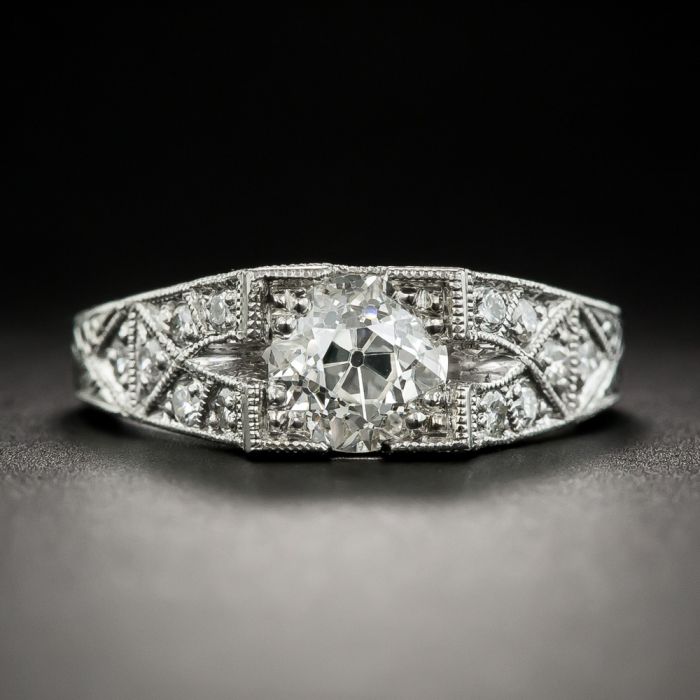 Modern Sapphire And Diamond Engagement Ring In Platinum