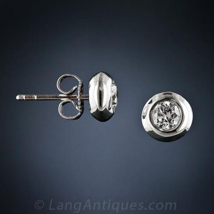 Half carat top solitaire earrings