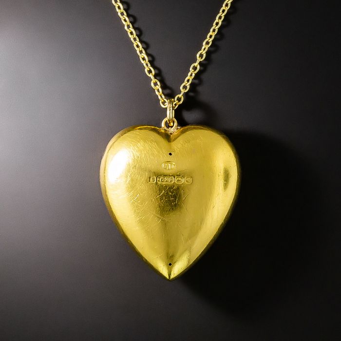 Puffed gold deals heart pendant