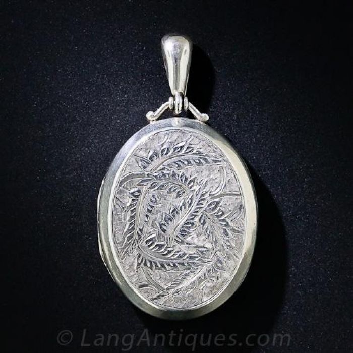 Unusual silver shop lockets