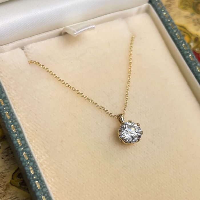 14K Yellow Gold .12 Carat Diamond Side Cross Necklace – Carroll's
