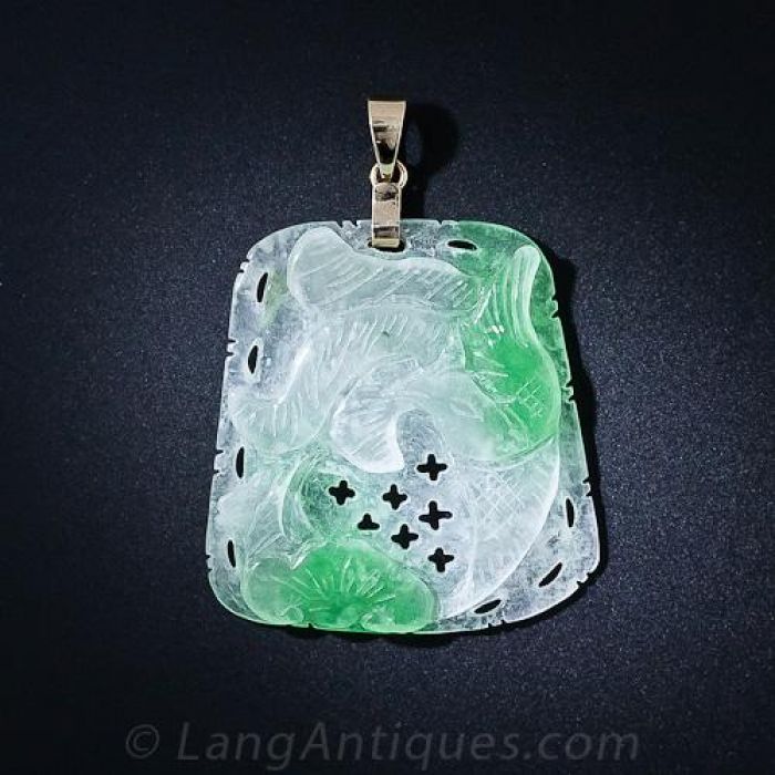Vintage carved sales jade pendant