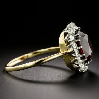 English Mid-Century Garnet and Diamond Halo Ring