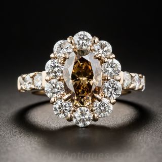 1.56 Carat Natural Deep Orange Brown Oval Diamond 18K Rose Gold and Diamond Ring
