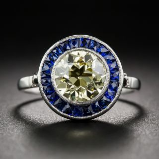 1.63 Carat GIA: Natural Fancy Yellow - VS2 Diamond and Calibre Sapphire Ring