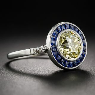 1.63 Carat GIA: Natural Fancy Yellow - VS2 Diamond and Calibre Sapphire Ring