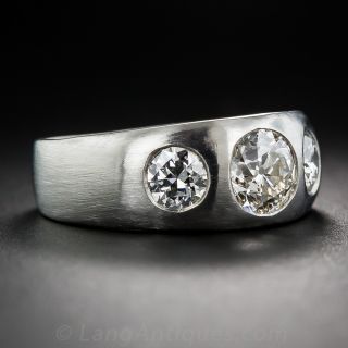 1920's 1.93 Carat Total Weight Three-Stone Diamond Platinum Ring
