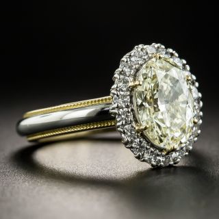 2.11 Carat Light Yellow Oval Diamond Ring GIA