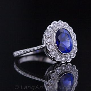 2.46 Carat Oval Cut Sapphire and Diamond Ring