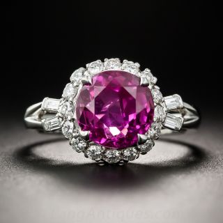 3.41 Carat Pink Sapphire Platinum and Diamond Halo Ring