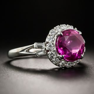 3.41 Carat Pink Sapphire Platinum and Diamond Halo Ring