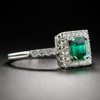 .61 Carat Emerald and Diamond Platinum Halo Ring
