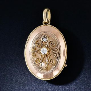 Antique 18 Karat Two-Tone Gold and Diamond Locket