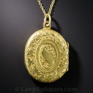 Antique 18K Oval Horseshoe Locket 