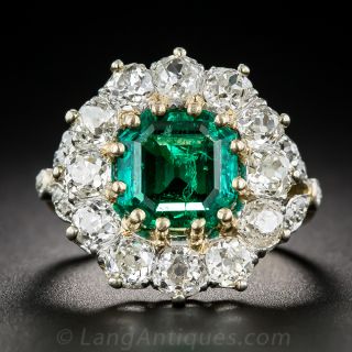 Antique Emerald and Diamond Halo Ring