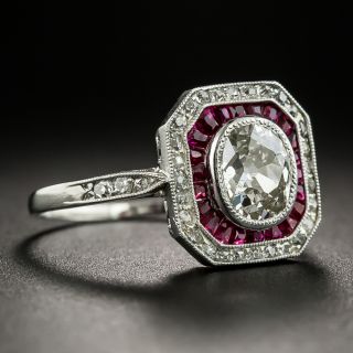 Art Deco .86 Carat Antique Oval Diamond and Ruby Platinum Ring