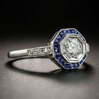 Art Deco Style .33 Carat Diamond Platinum Calibre Sapphire Halo Ring