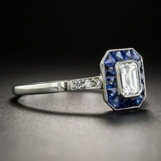 Art Deco Style .44 Carat Emerald-Cut Diamond Calibre Sapphire Halo Ring
