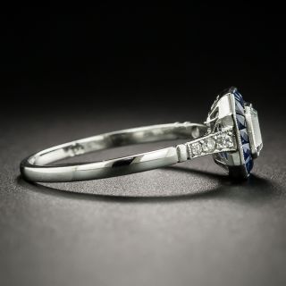 Art Deco Style .55 Carat Emerald-Cut Diamond and Sapphire Halo Ring