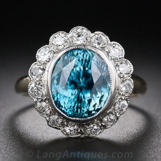 Blue Zircon and Diamond Halo Ring