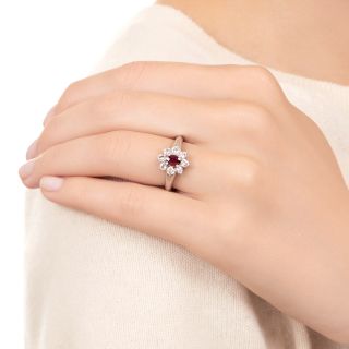 Classic .46 Carat Oval Ruby and Diamond Halo Ring
