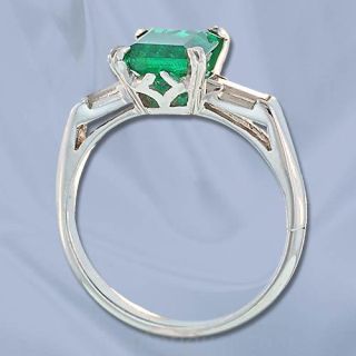 Classic Emerald and Diamond Ring