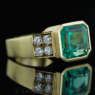 Contemporary Emerald and Diamond Ring