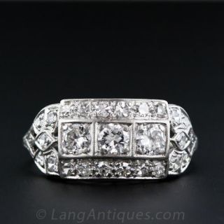 Diamond & Platinum Three Stone Band Ring