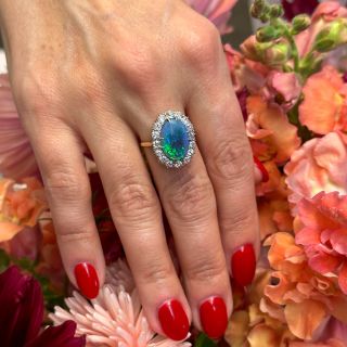Edwardian Black Opal and Diamond Halo Ring