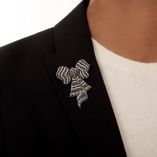 Edwardian Diamond and Onyx Bow Knot Brooch, French