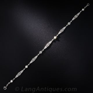 Edwardian Natural Pearl, Platinum and Diamond Bracelet 