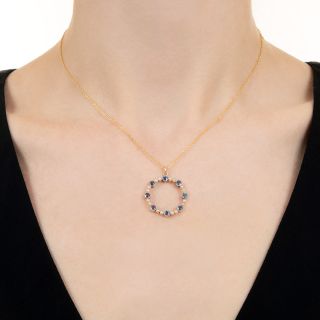 Edwardian Yogo Sapphire and Natural Pearl Circle Pendant 