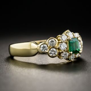 Emerald and 18K Gold Diamond Ring