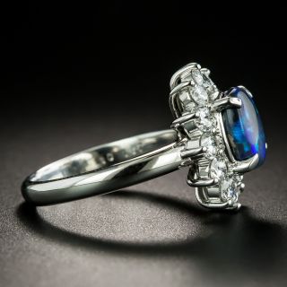 Estate 1.67 Carat Black Opal and Diamond Halo Ring