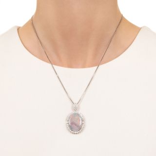 Estate 12.36 Carat Opal and Diamond Halo Pendant