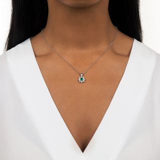 Estate .26 Carat Emerald and Diamond Halo Pendant